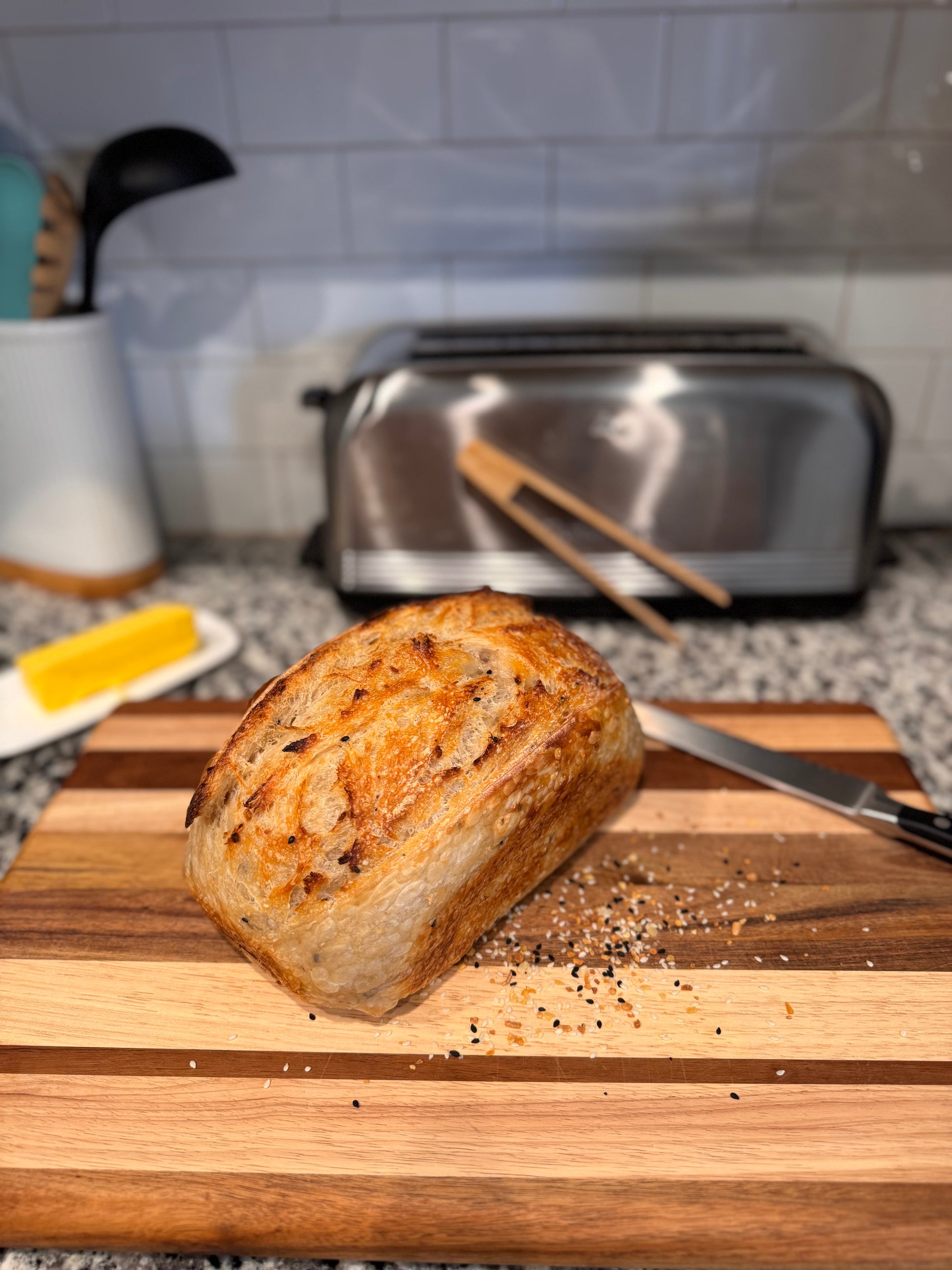 Everything sourdough bread with savory topping from The Sour Crumb bakery